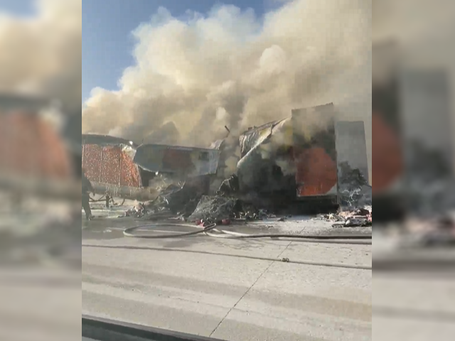 Massive Fire On Semi Truck Carrying Thousands Of Shoes In US
