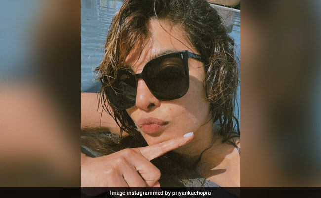Priyanka Chopra's Pool Playlist Proves She's Still A Total Desi Girl. Name These 90s Songs
