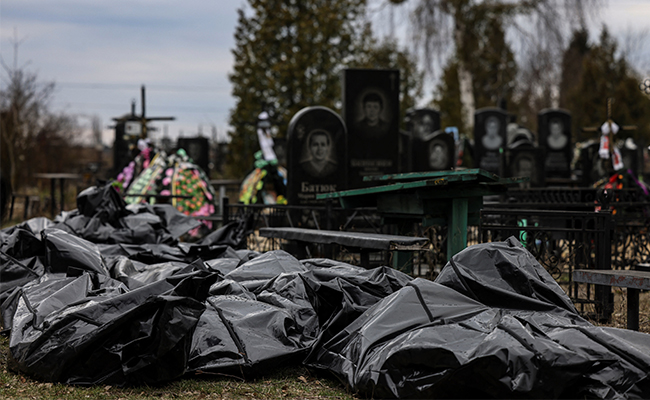 In Ukraine's Bucha, The Horror Of Searching For Family Among Body Bags
