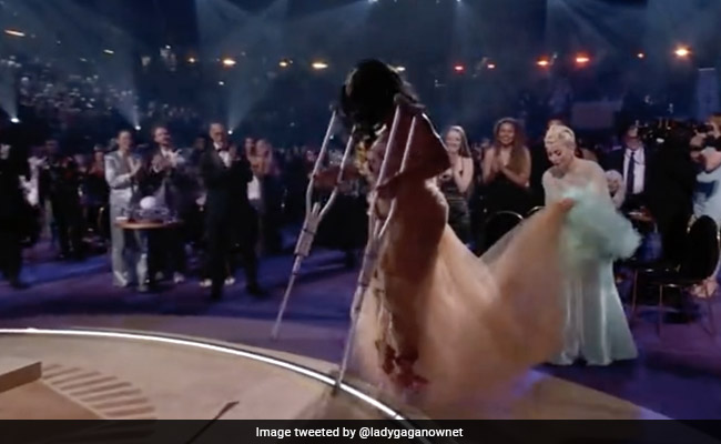 Grammys 2022: Lady Gaga Is The Internet's Hero For Helping SZA, On Crutches, With Dress