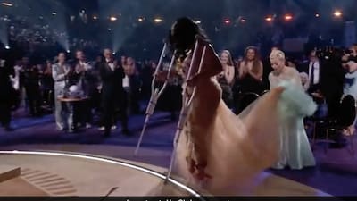 lady gaga grammys dress 2022 Lady Gaga Makes Bold Entrance at 2026 Grammys in Feathered Gown