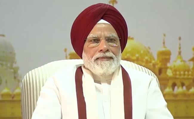 PM Modi Hosts Sikh Delegation At Delhi Residence, Sports Red Turban