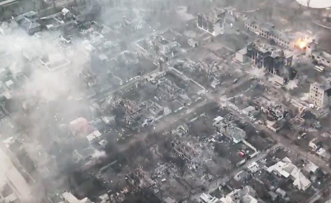 Watch: Ukraine Tank "Snipes" Russian Military Vehicle Through Building