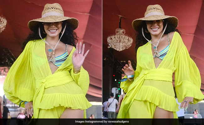 Vanessa Hudgens Is Still Very Much The Coachella Queen In Her Neon Ruffled Dress And Striped Bralette