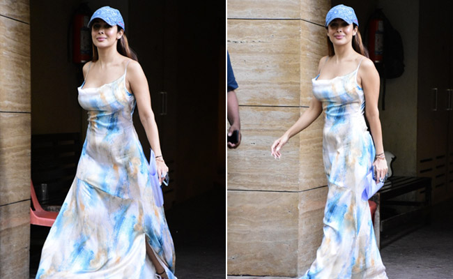 Sneakers And A Cap With A Strap Maxi Dress? Only Malaika Arora Can Pull It Off