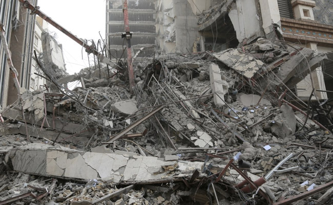 Iran Building Collapse: Death Count Rises To 14, Dozens Feared Trapped