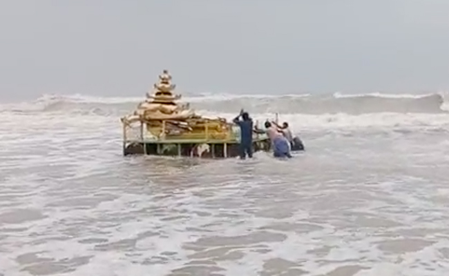 Watch: Mysterious Gold-Coloured Chariot Washes Ashore In Andhra