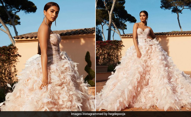 Cannes 2022: Pooja Hegde Makes A Dreamy Debut At The 75th Cannes Film Festival In A Beautiful White Feather Gown