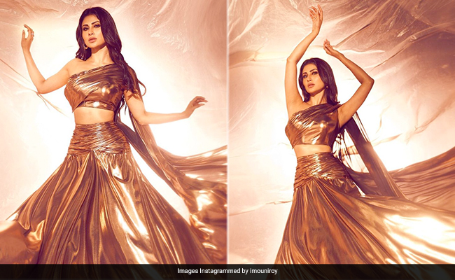 You Cant Miss Mouni Roy When She Dazzles So Bright In  A Stunning Gold Metallic Skirt And Crop Top