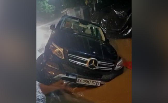 Watch: 2 Wheels In Air, Mercedes SUV Stuck On Waterlogged Bengaluru Road