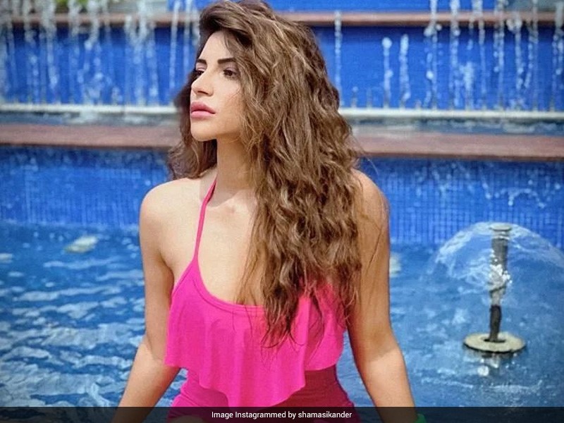Shama Sikander Is Making This Pool Day Look Even Sunnier In Her Fuchsia Swimsuit