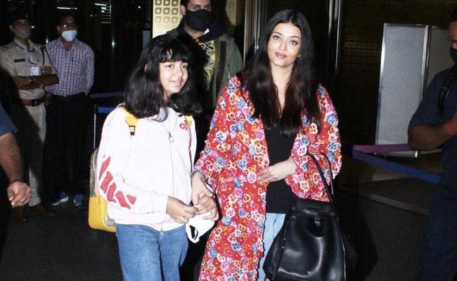 Aishwarya Rai Bachchan Returns With Abhishek Bachchan And Aaradhya From Cannes. Watch