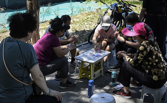 "Pandemic Won't Stop Us": Beijing Residents Find Their Way Around Curbs