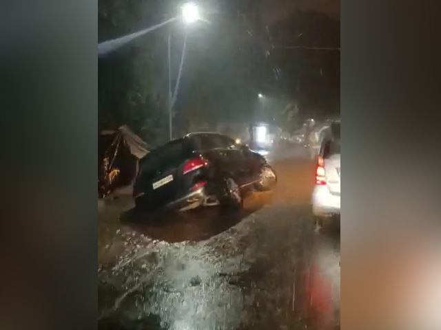Watch: 2 Wheels In Air, Mercedes SUV Stuck On Waterlogged Bengaluru Road