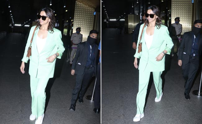 Cannes Boss Lady Deepika Padukone Powers Back To Mumbai In A Bright Green Pantsuit