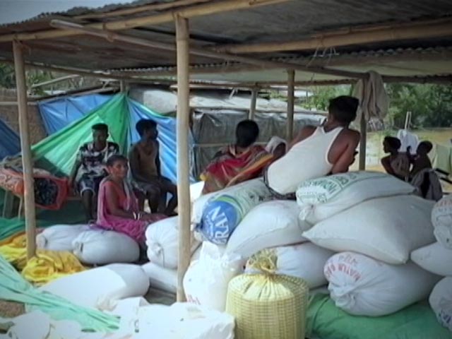 Farmers Use National Highway To Dry Crops As Floods Ravage Assam Farmers Use National Highway To Dry Crops As Floods Ravage Assam