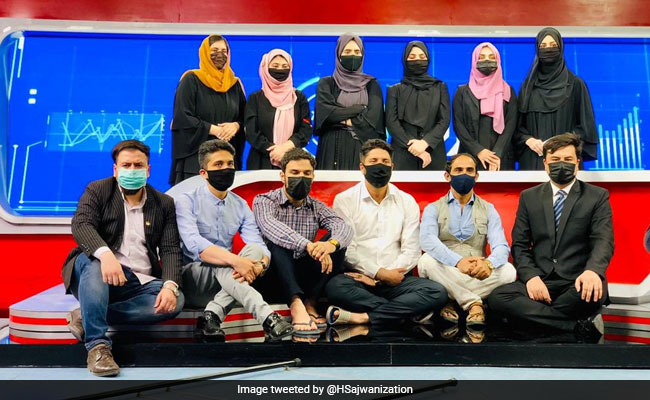 Afghan Male Anchors Stand With Women Colleagues Against Taliban's Order