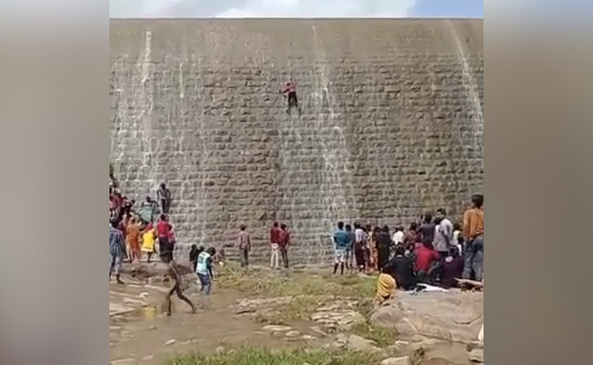 Watch: Man Falls Off Dam Wall During Dangerous Stunt, Now Faces A Case