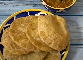 Chana Dal Poori Is A Popular Bengali Breakfast Food; Watch The Recipe Video To Try It