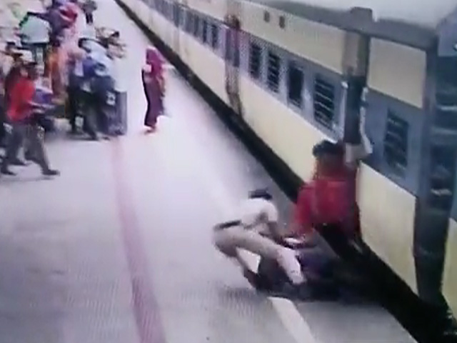 Caught On Camera: Railway Cop Saves Woman Passenger's Life