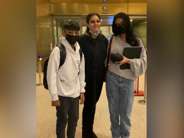 Kajol Poses With Kids Nysa And Yug At The Airport