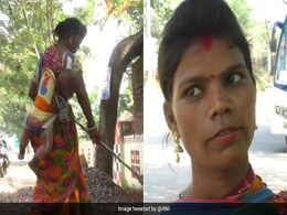Watch: Odisha Sanitary Worker Sweeps Road While Carrying Baby On Back, Internet Lauds Commitment Watch: Odisha Sanitary Worker Sweeps Road While Carrying Baby On Back, Internet Lauds Commitment