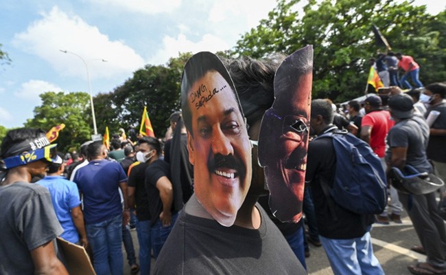 Crowds Jeer Sri Lankan PM: "We Will Worship You- If You Leave"