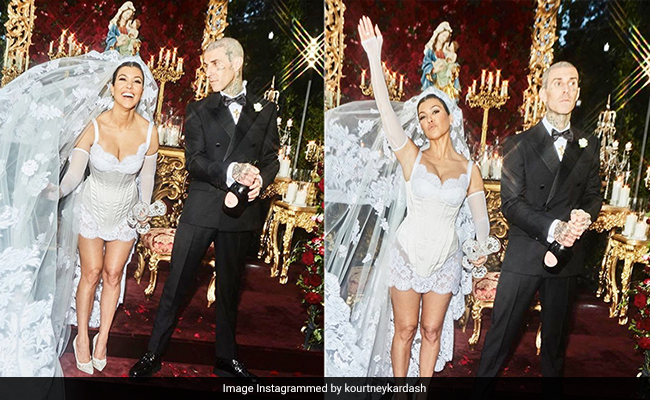 Kourtney Kardashian Married Travis Barker In A Dolce & Gabbana Corset Mini Dress With A Lace Veil Featuring Virgin Mary