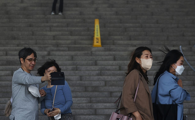 South Korea Drops Outdoor Mask Rule But Many Prefer To Keep Them On