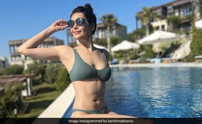 Karishma Tanna Is "Too Cool For The Summer" In A Chic Green Swimsuit
