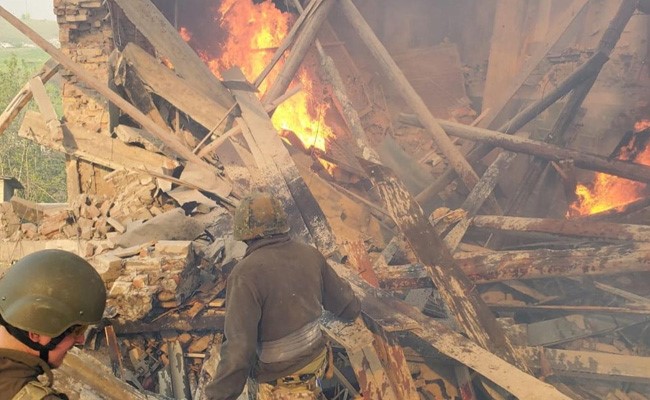 As Russia Readies Military Pomp, School Attack Kills 60 In Ukraine