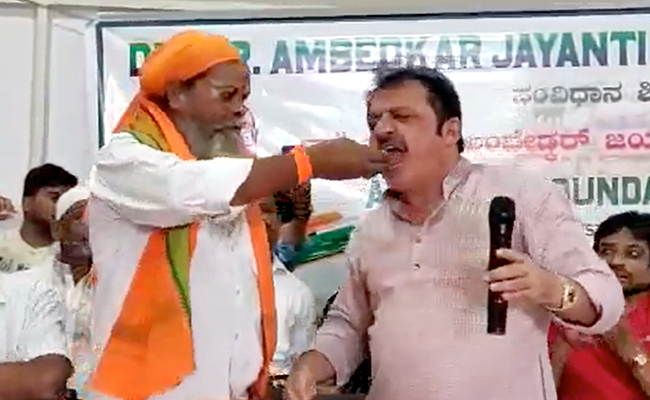 Watch: Karnataka Politician's Gesture For Dalit Priest In Unity Message