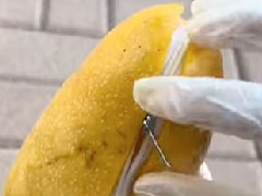 Is It A Mango Or A Purse? Bizarre Video Has Our Lips 'Zipped'