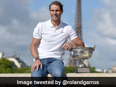 Rafael Nadal Poses With French Open Trophy With Eiffel Tower In Background. See Pic