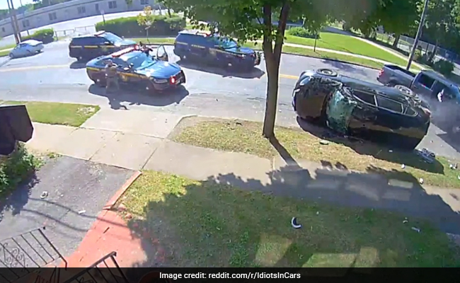 On Camera, Car Skids And Overturns During Police Chase