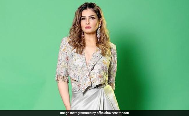 Raveena Tandon Redefines Her Fashion Aesthetic In An Embroidered Crop Jacket And Skirt