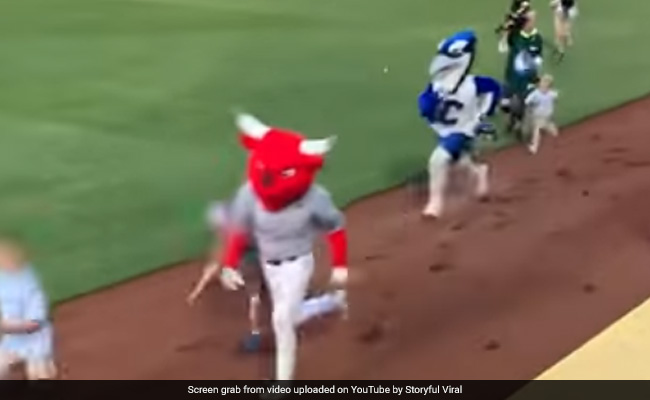 Mascot Bull Knocks Over Child During Race at Baseball Championship In US