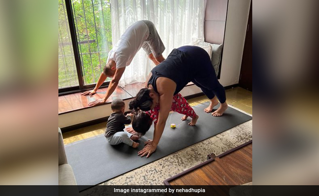 Neha Dhupia's Mom Life Is About "Balance" - That Applies To Yoga As Well