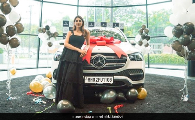 <i>Bigg Boss 14</i> Star Nikki Tamboli Brings Home A Swanky New Mercedes. See What She Posted