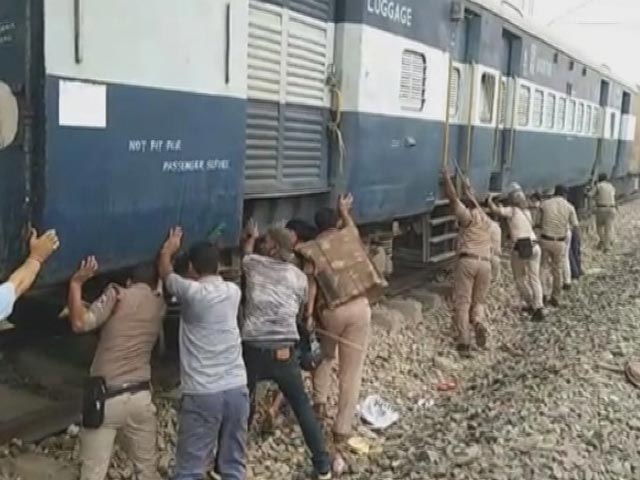 Cops Push Coaches Away From Burning Train Amid 'Agnipath' Protests