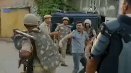 Watch: Protesters Beaten With Sticks By Cops During Arrest In UP's Prayagraj