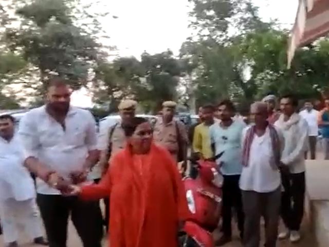 Uma Bharti Throws Cow Dung At Liquor Shop In Madhya Pradesh