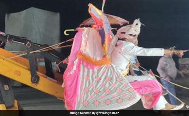 Madhya Pradesh Man Booked, Fined For Using Bulldozer In Marriage Procession