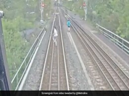 Watch: Child Narrowly Escapes Incoming Train While Running On Tracks Watch: Child Narrowly Escapes Incoming Train While Running On Tracks
