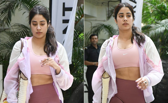 Janhvi Kapoor Makes A Strong Case For Stepping Out In Sporty Style In Her Blush Sports Bra And Mauve Tights