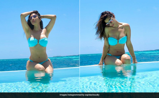 Sophie Choudry Is "Mentally Here" At The Poolside Matching The Clear Blue Water In Her Swimsuit
