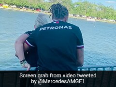 Watch: Lewis Hamilton Pushes Mercedes Physio Into River After Winning Bet