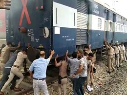 Watch: Cops Push Coaches Away From Burning Train Amid 'Agnipath' Protests Watch: Cops Push Coaches Away From Burning Train Amid 'Agnipath' Protests