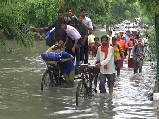 Delhi Rain Floods Roads, People Forced To Abandon Vehicles To Get To Work