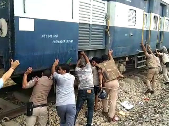 Watch: Cops Push Coaches From Burning Train Amid UP 'Agnipath' Protest